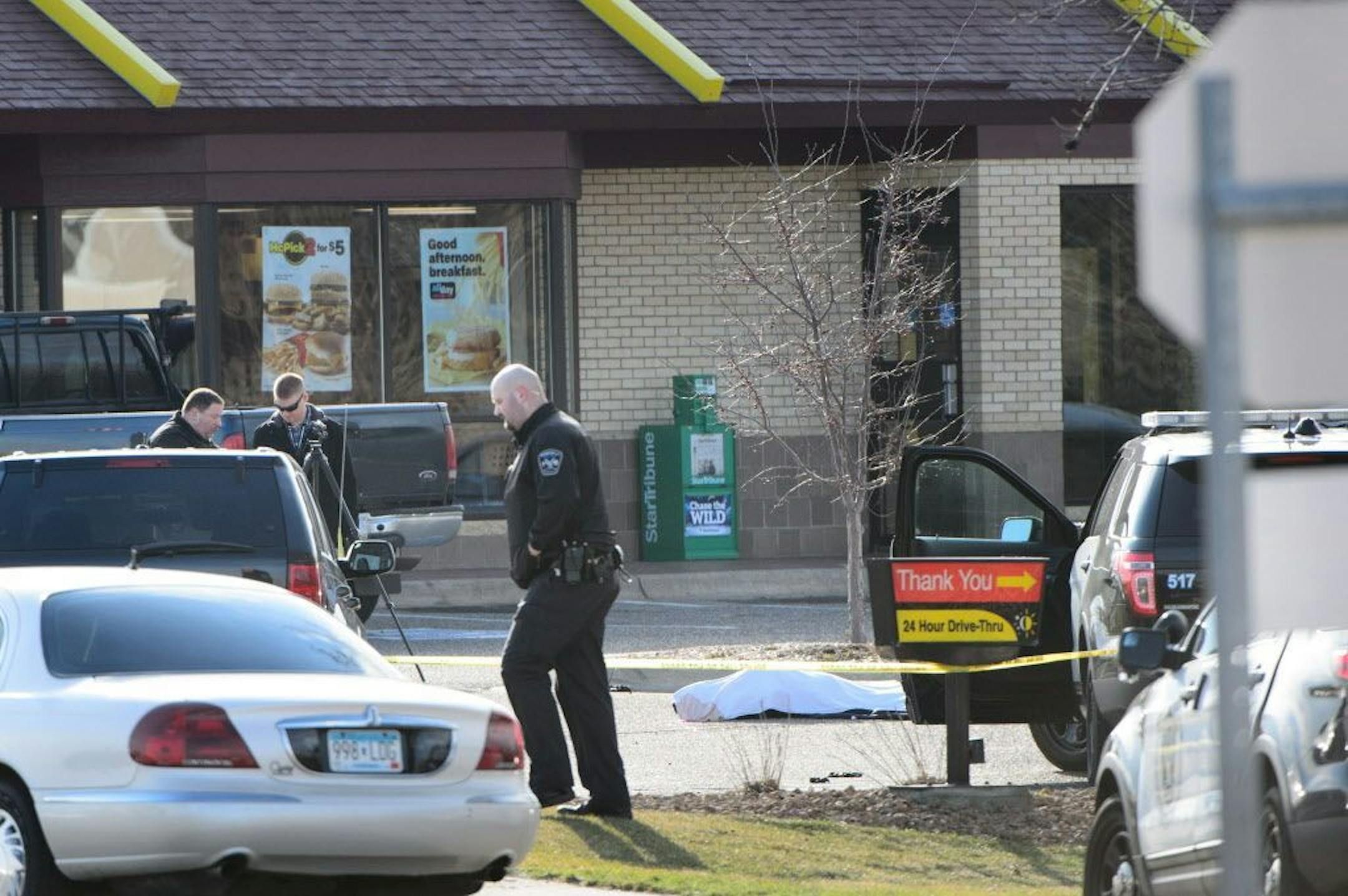 Burnsville Police investigate a fatal shooting by police that occurred in a McDonald's parking lot Thursday morning.