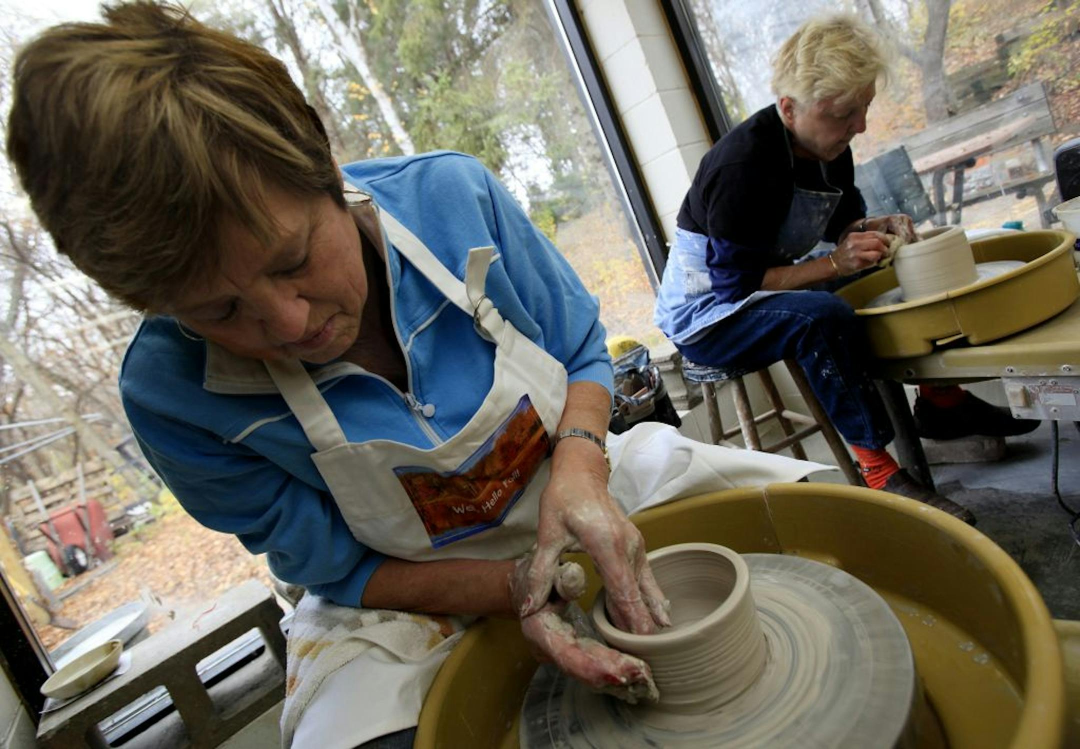 Linda Mona (left) and Sue Sheets worked on pottery projects at the Edina Art Center in Edina, MN at on October 26, 2012.