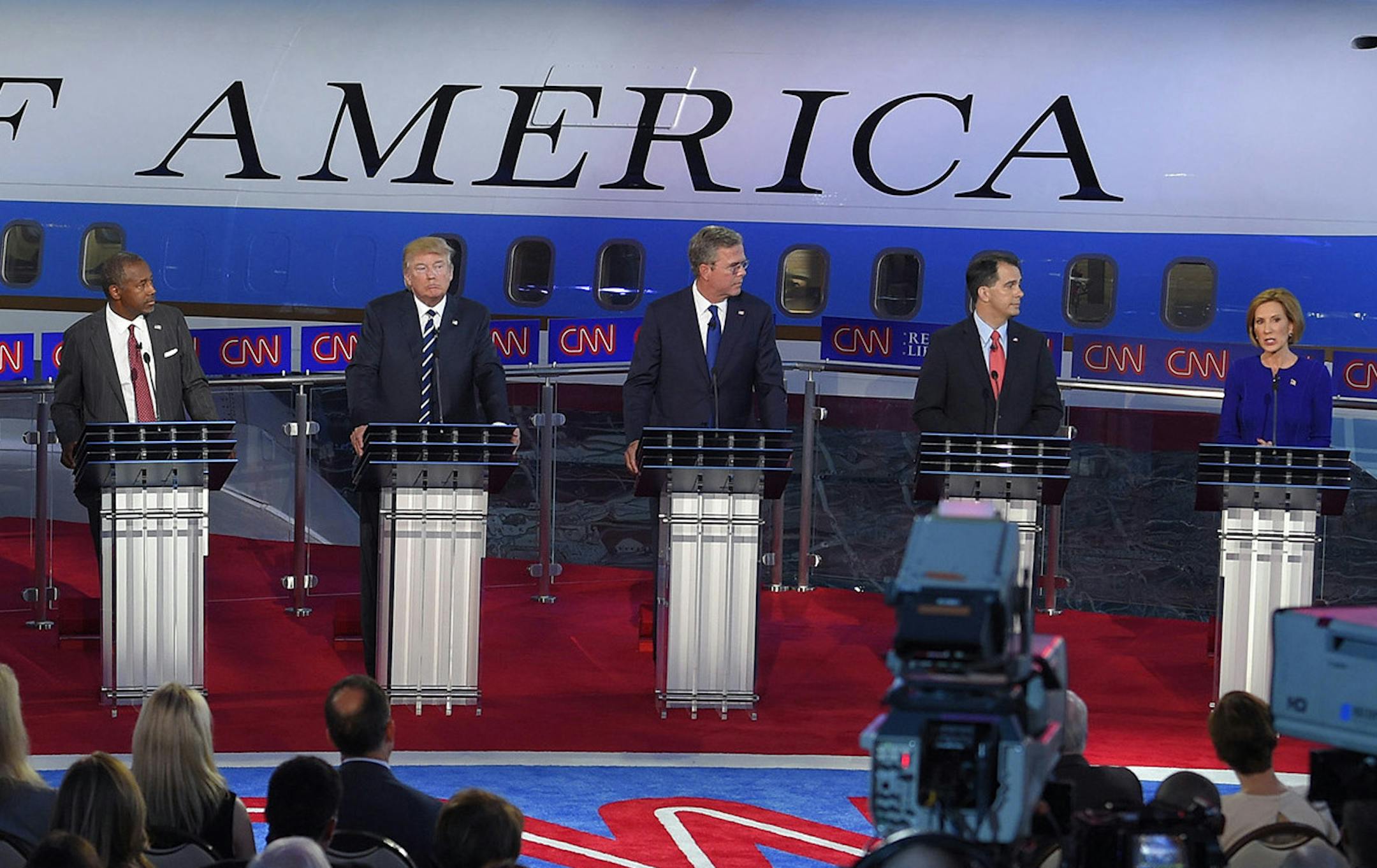 Republican presidential candidates, from left, former Arkansas Gov. Mike Huckabee, Sen. Marco Rubio, R-Fla., Sen. Ted Cruz, R-Texas, retired neurosurgeon Ben Carson, businessman Donald Trump, former Florida Gov. Jeb Bush, Wisconsin Gov. Scott Walker, businesswoman Carly Fiorina, and Ohio Gov. John Kasich, appear during the CNN Republican presidential debate at the Ronald Reagan Presidential Library and Museum on Wednesday, Sept. 16, 2015, in Simi Valley, Calif. (AP Photo/Chris Carlson) ORG XMIT: