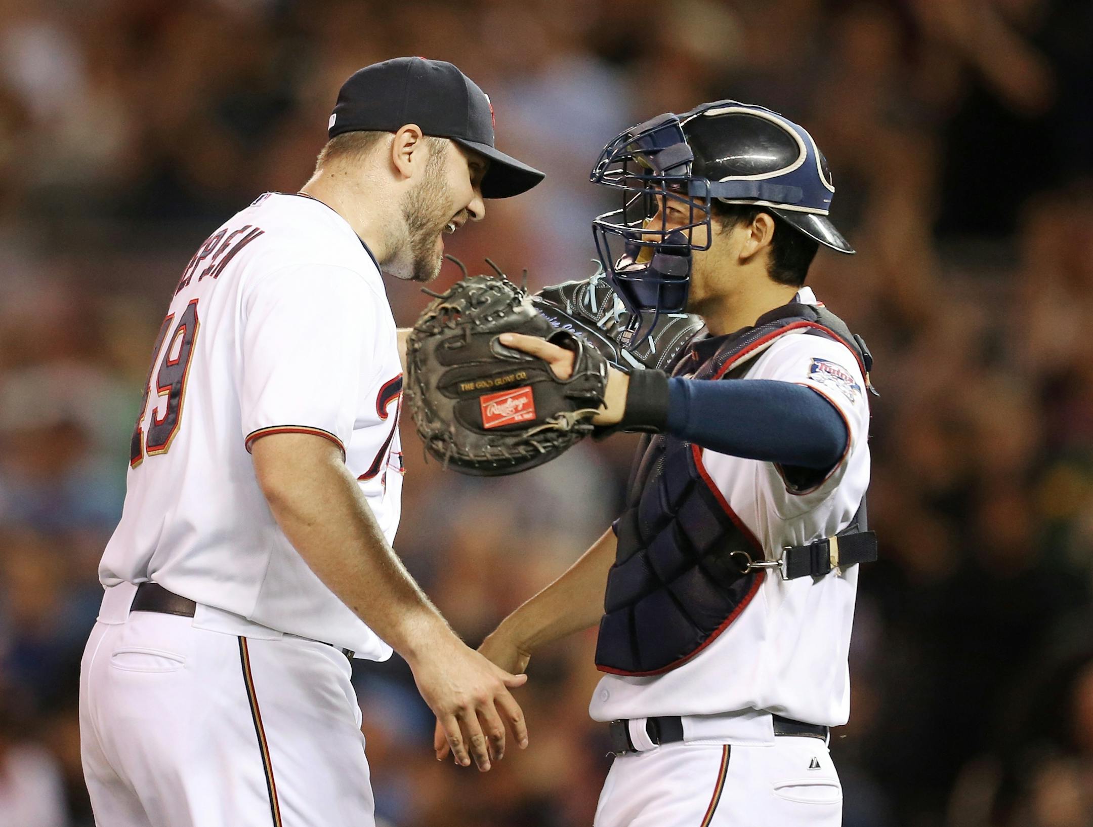 Minnesota Twins relief pitcher Kevin Jepsen (49) celebrated a win with catcher Kurt Suzuki (8) at Target Field Tuesday September 22, 2015 in Minneapolis, MN.