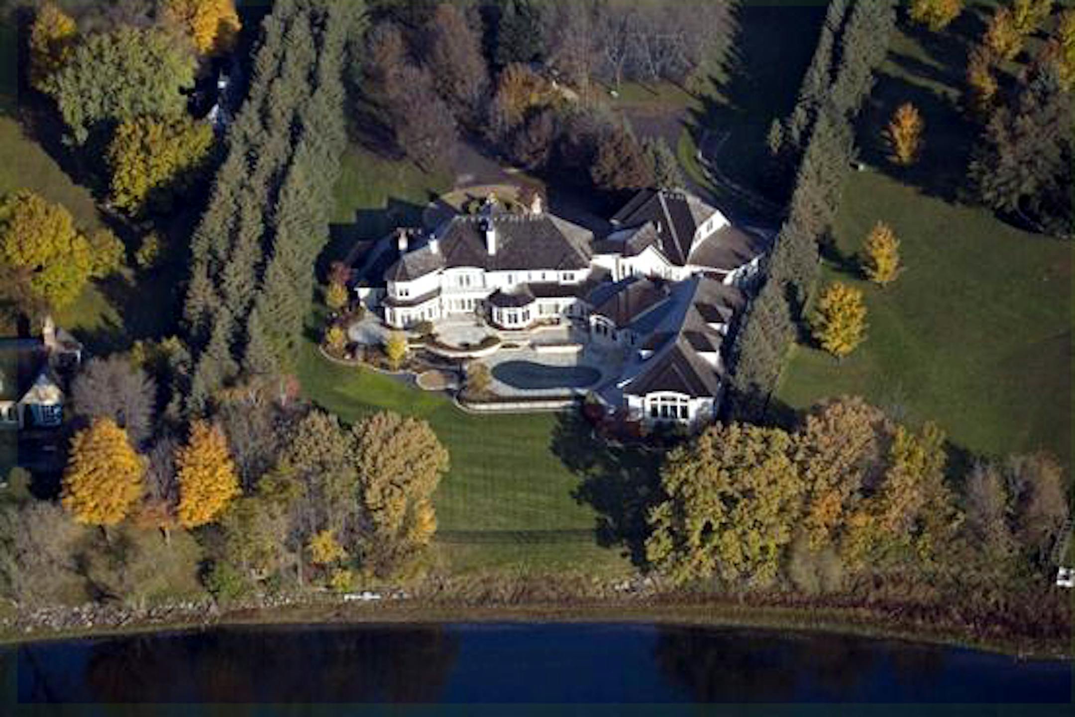 The 17,251-square-foot home formerly owned by Denny Hecker, sits on 5.35 acres at 1492 Hunter Dr. in Medina.