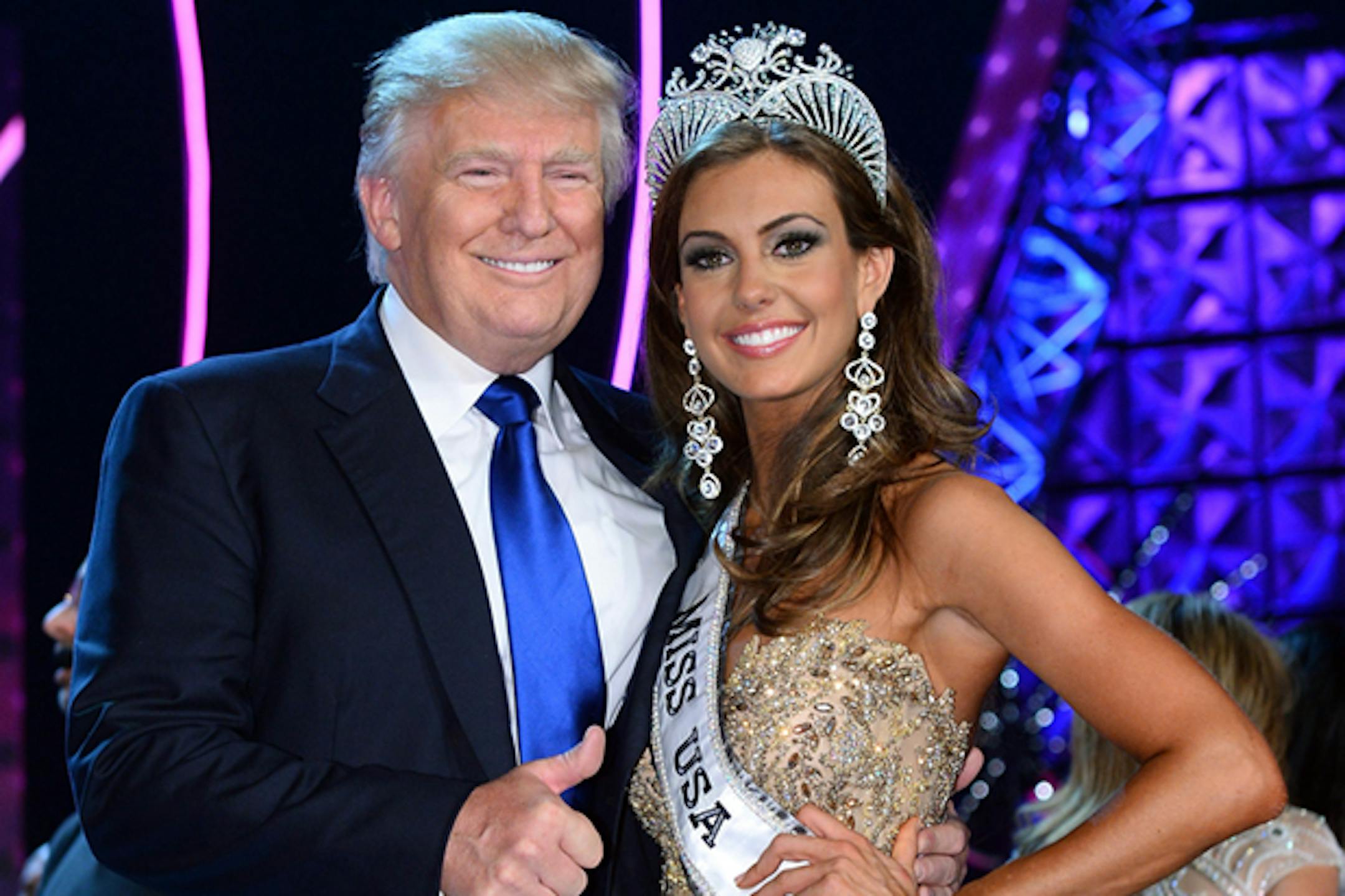 Donald Trump (L) and Miss Connecticut USA Erin Brady pose onstage after Brady won the 2013 Miss USA pageant at PH Live at Planet Hollywood Resort & Casino on June 16, 2013 in Las Vegas, Nevada.