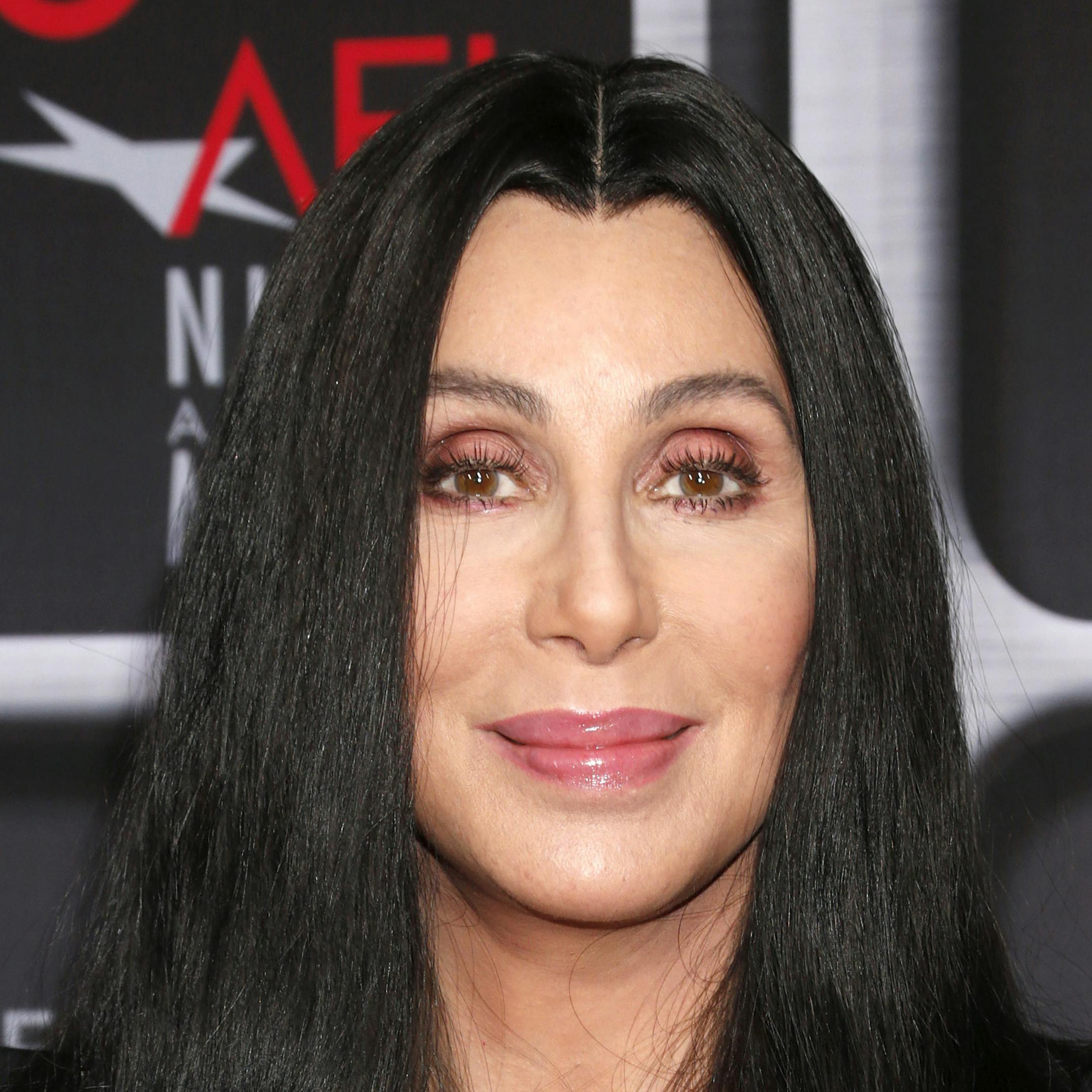 FILE - This April 24, 2013 file photo shows performer Cher at the AFI Night at the Movies at the ArcLight in Los Angeles. Cher will be performing on the singing competition series "The Voice" during the season finale on Tuesday, June 18. She will perform ìWomanís Worldî the first single off of her upcoming album. (Photo by Todd Williamson/Invision/AP, file)