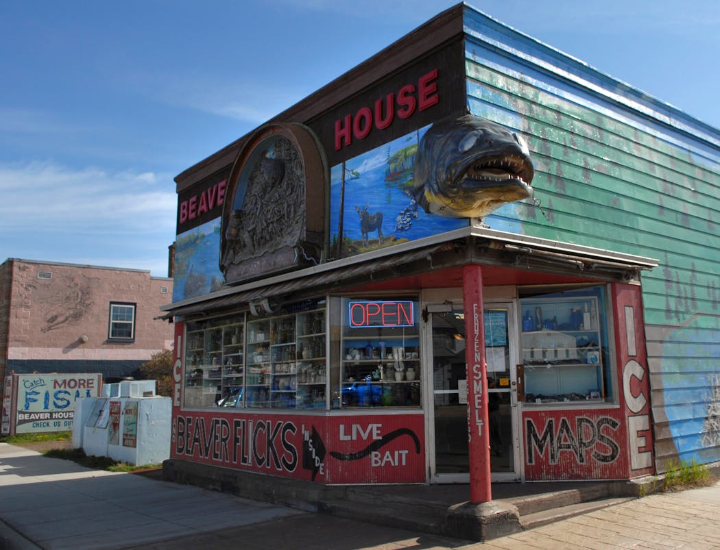Beaver House Bait Shop in Grand Marais has a walleye sticking out of its roof.