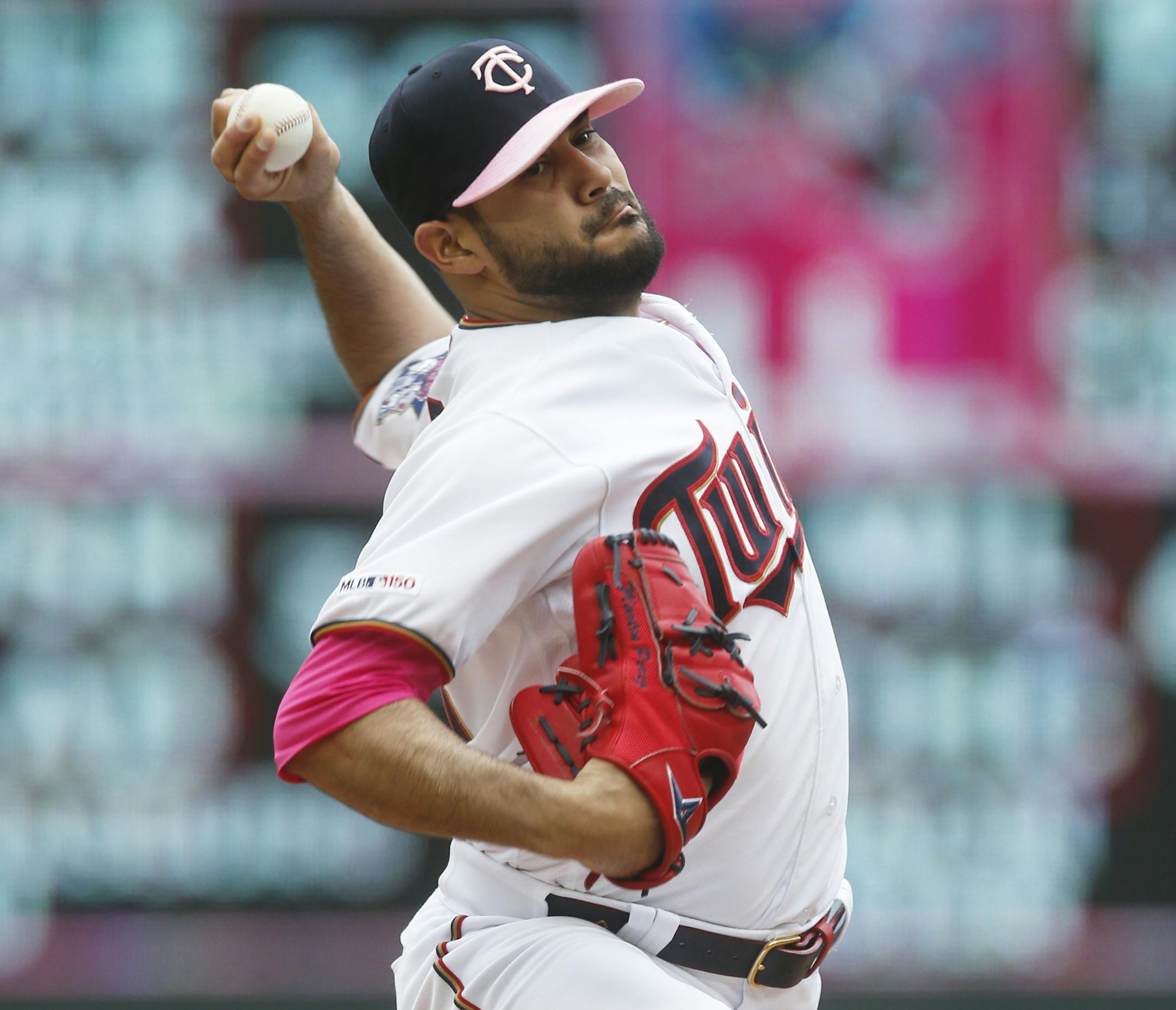 Minnesota Twins pitcher Martin Perez throws against the Detroit Tigers in the first inning of a baseball game Sunday, May 12, 2019, in Minneapolis. (AP Photo/Jim Mone)