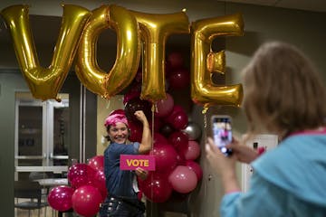 Emily Roskey, 28, in costume as Rosie the Riveter, posed for a photo at a Planned Parenthood event where volunteers worked phone banks.