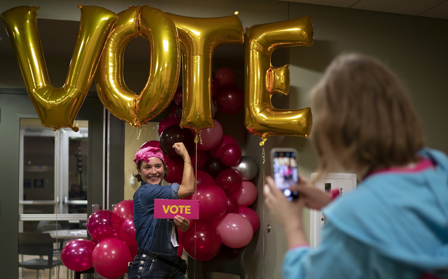 Emily Roskey, 28, in costume as Rosie the Riveter, posed for a photo at a Planned Parenthood event where volunteers worked phone banks.