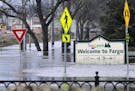 Fargo won't be able to start work on its $2.1 billion flood control project until Minnesota decides whether to permit the project. In 2011, floodwater