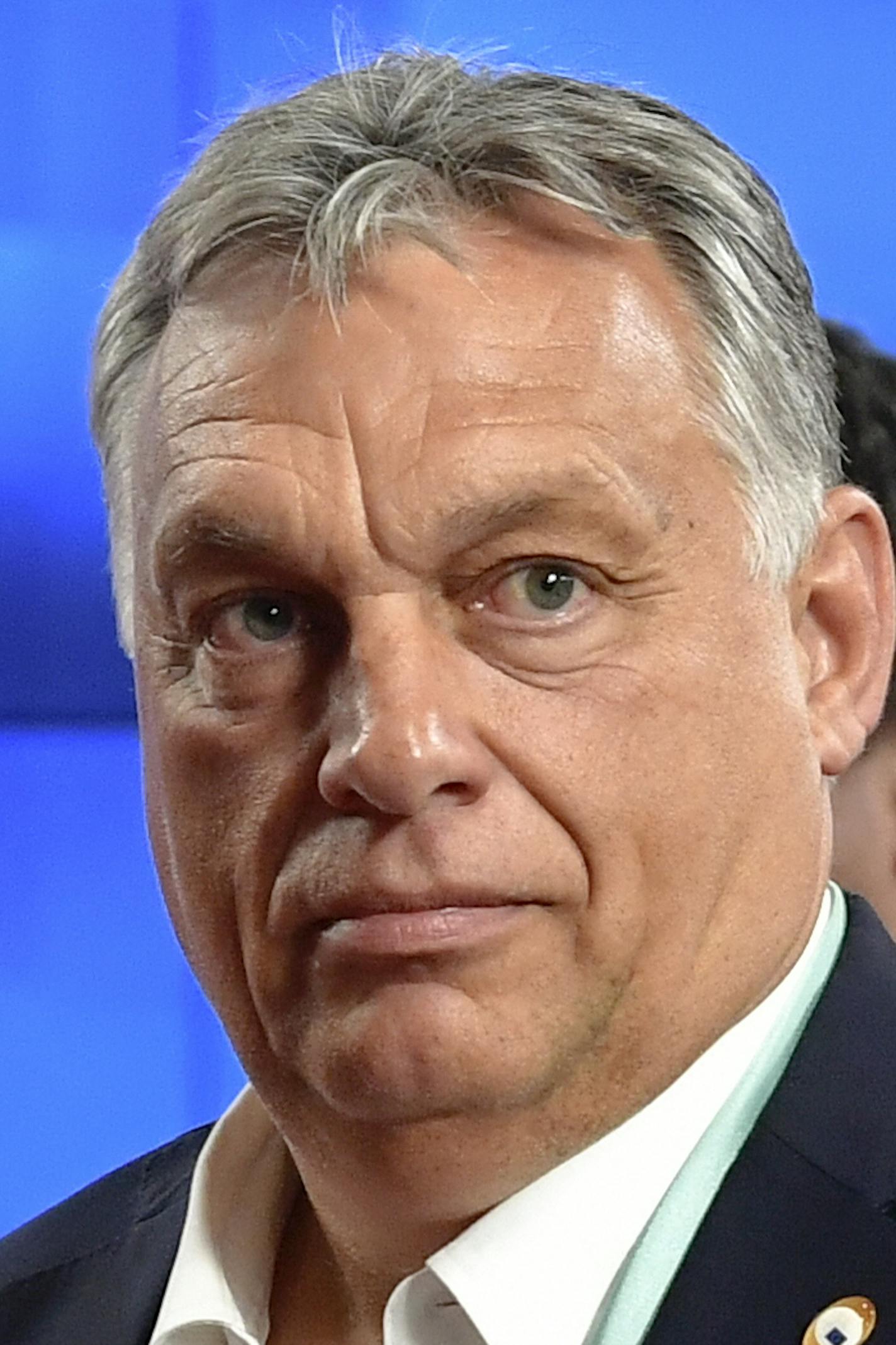 FILE - In this Saturday, July 18, 2020, file photo, Hungary's Prime Minister Viktor Orban gestures at an EU summit in Brussels. Hungary's prime minister says that his country won a "very important battle" at the European Union summit this week, where national leaders of the 27-member bloc decided an seven-year budget and economic recovery package to counter the effects of the coronavirus pandemic. (John Thys, Pool Photo via AP, File)