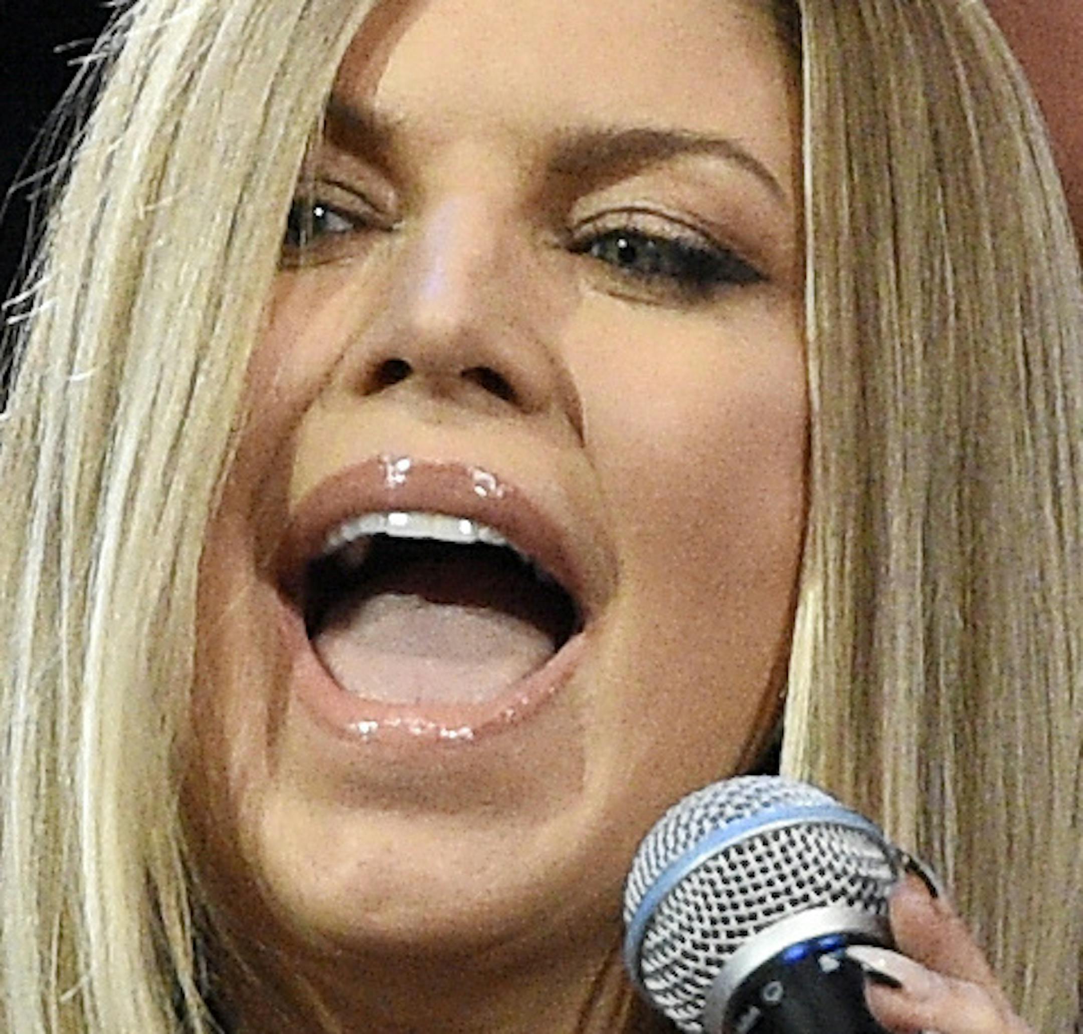 Singer Fergie performs the national anthem prior to an NBA All-Star basketball game, Sunday, Feb. 18, 2018, in Los Angeles. (AP Photo/Chris Pizzello)