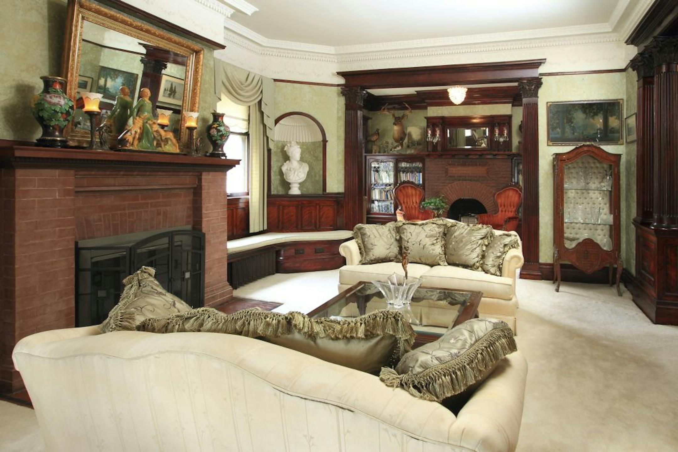 provided photo / Seth Hannula gaze0529,- 1903 colonial revival, living room, Lakes Area Realty