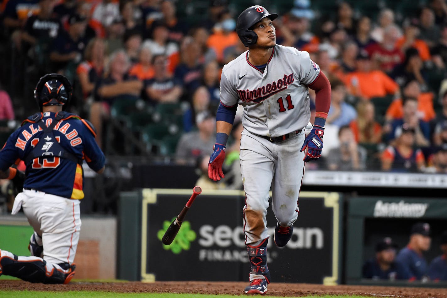 Minnesota Twins' Jorge Polanco watches his three-run home run during the sixth inning of a baseball game against the Houston Astros, Sunday, Aug. 8, 2021, in Houston. (AP Photo/Eric Christian Smith)