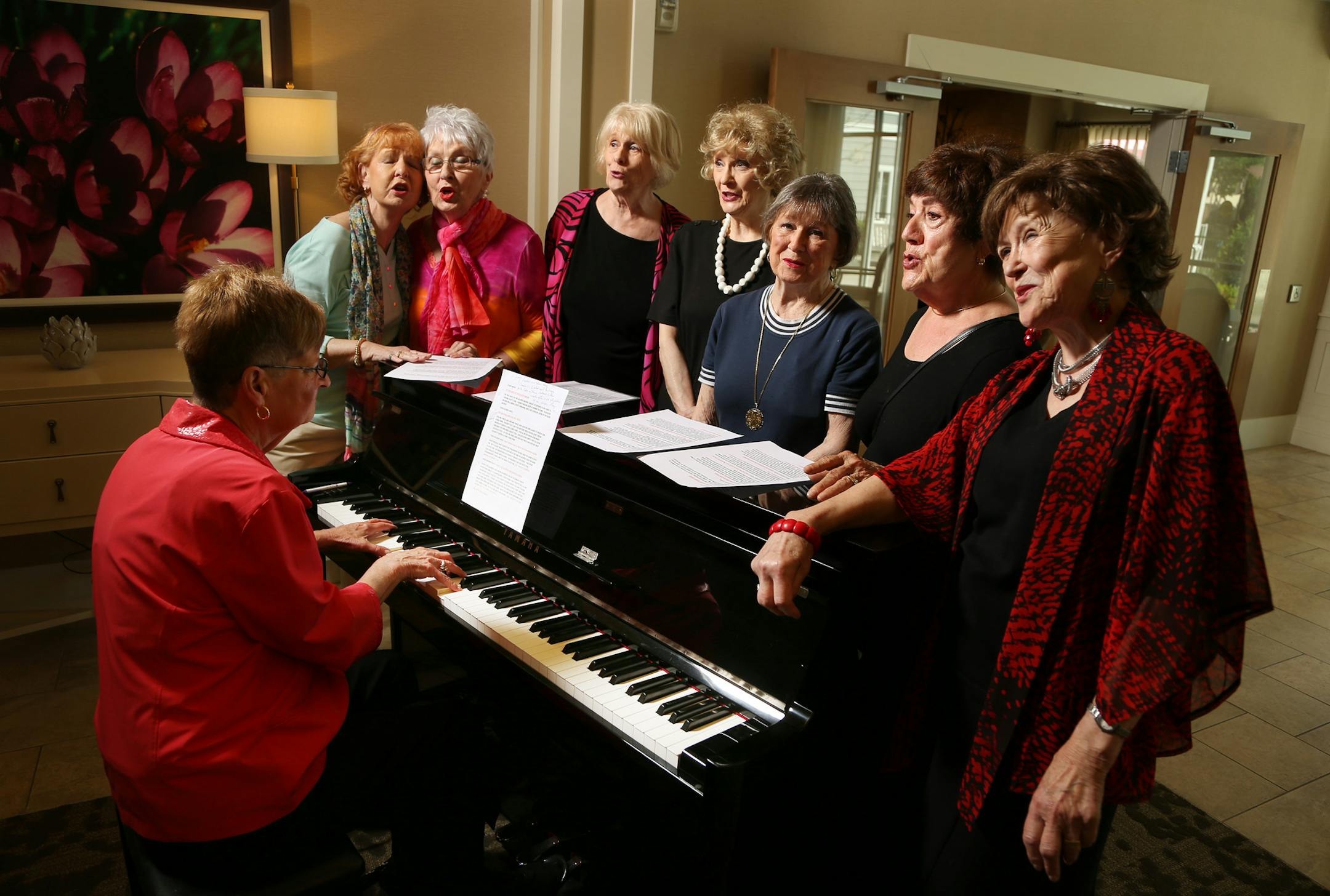 Former members of Schiek’s Singing Sextet gathered at the Waters on 50th in Minneapolis. From left, Judy Moen on piano, Mary Warme Malberg, Anne Thorgrimsen Marg, Florene Smith Majerus, Barbara Lang, Thelma Neve Johnson, Diane Paron Vnak and Rita Andrescik Goldstein. “We were the darlings of the Twin Cities,” Johnson said. “There were crowds every night.”