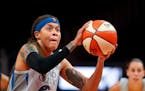 Seimone Augustus shoots a free throw during the first half