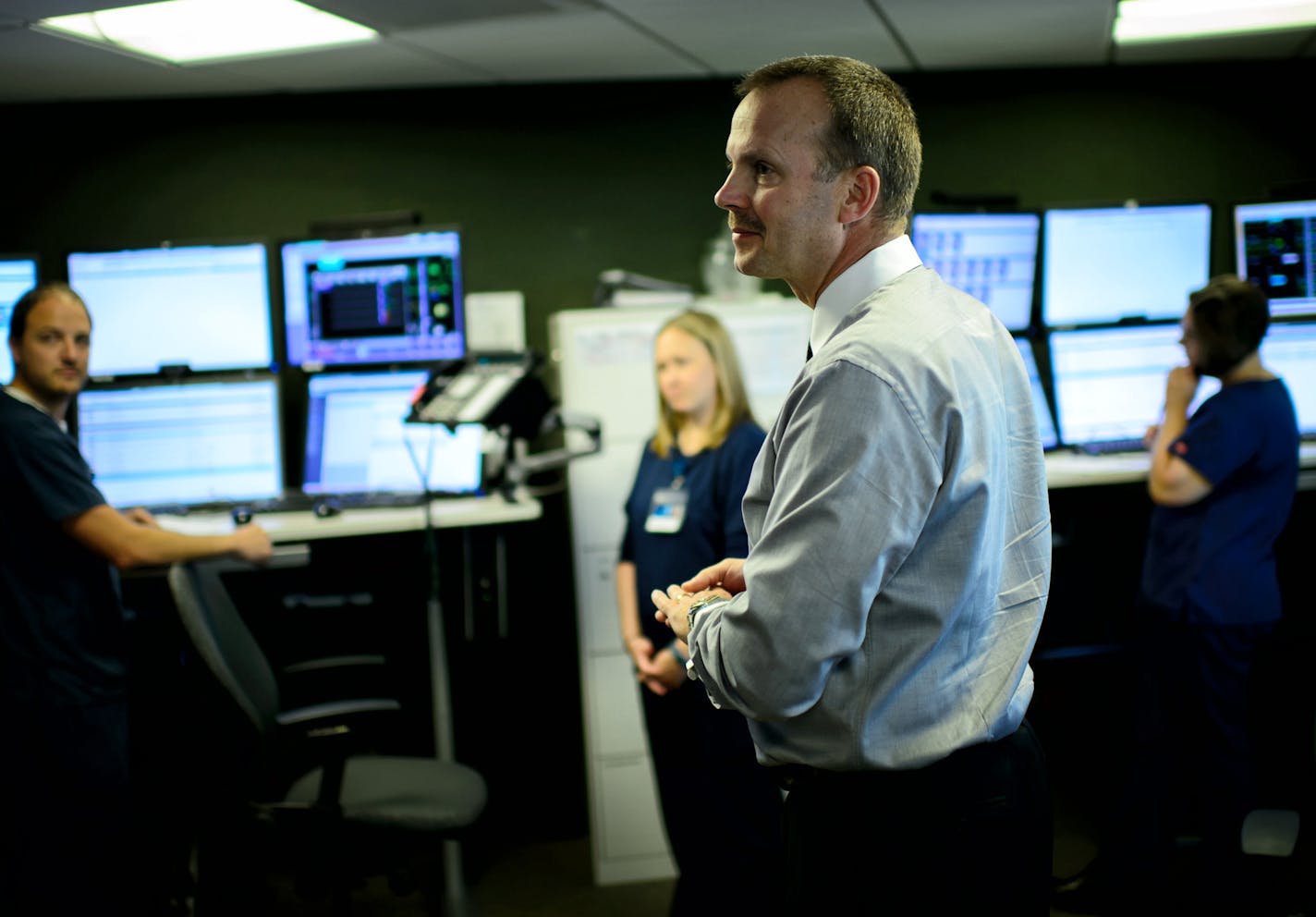 The larger view: Dr. Daniel Brown, center, is director of critical care for Mayo and is one of the doctors backing the eICU.