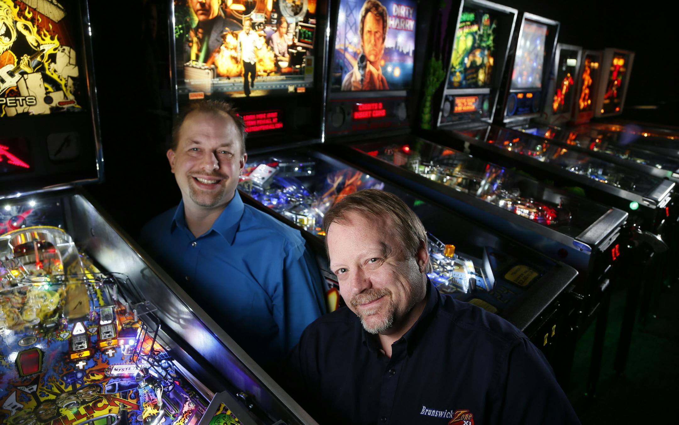 Paul Madison left, and Fred Richardson pinball players posed for a portrait at Brunswick Monday February 23, 2015 in Brooklyn Park, MN.] Jerry Holt/ Jerry.Holt@Startribune.com