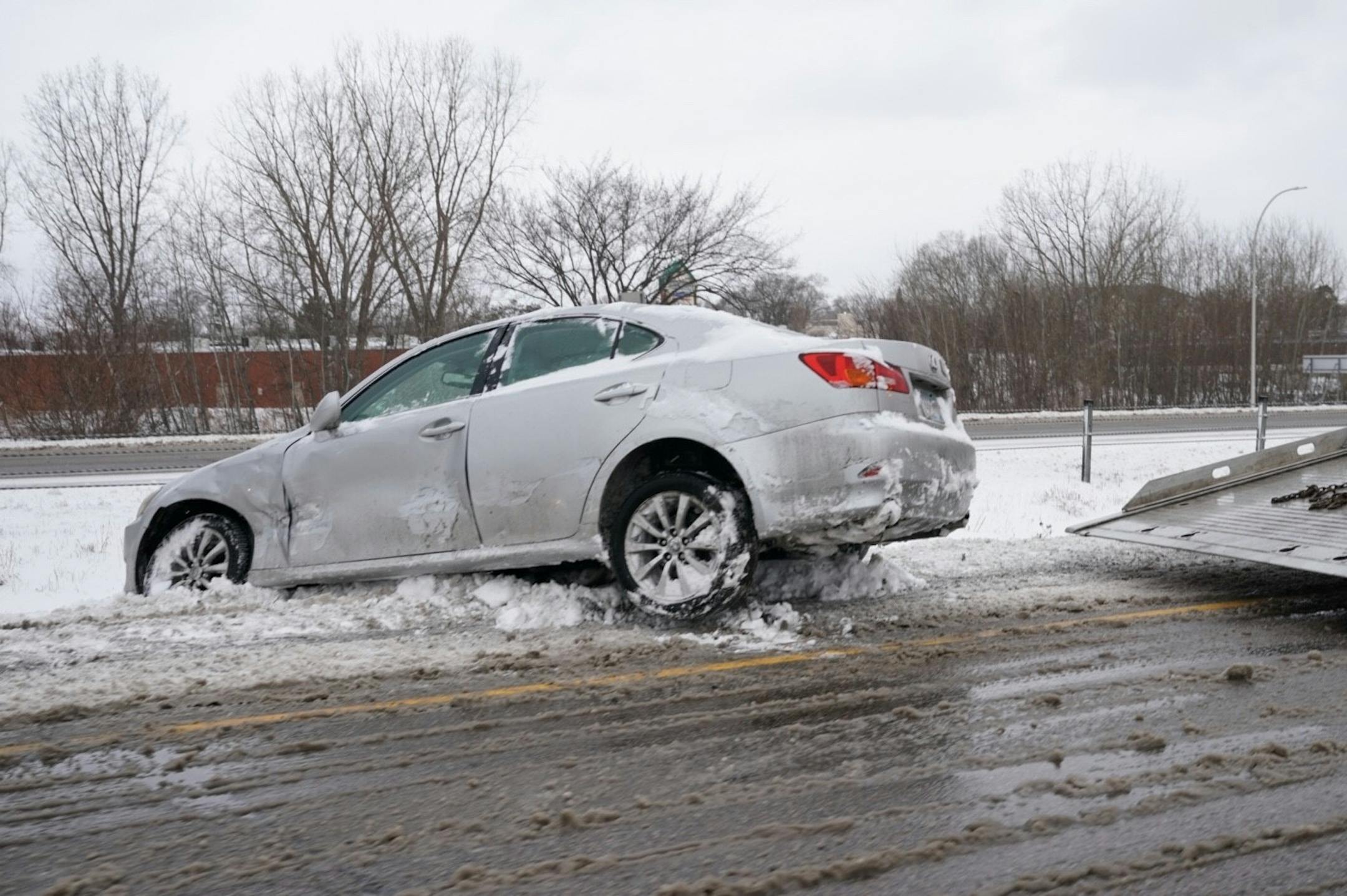 A car slid off highway 52 this morning in Inver Grove Heights during morning rush hour after a winter storm left more than 6 inches of snow across the Twin Cities overnight Monday.