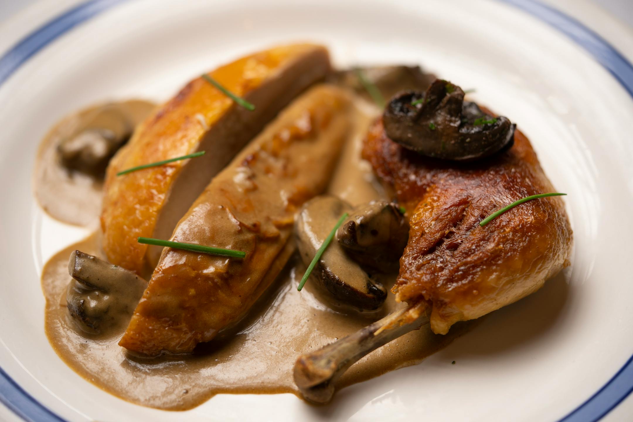 Charlie's chicken exceptional, with mushrooms, chicken liver, and Madeira cream sauce, as prepared under the direction of chef Jamie Malone at Charlie's at the Minneapolis Club.