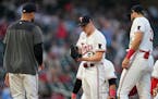Twins starting pitcher Sonny Gray yells as manager Rocco Baldelli comes to make a pitching change during the sixth inning Tuesday