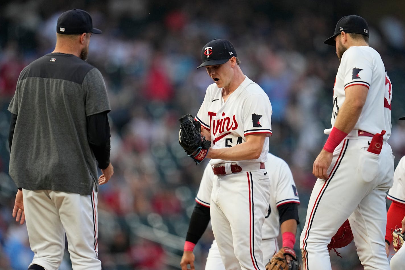 Twins starting pitcher Sonny Gray yells as manager Rocco Baldelli comes to make a pitching change during the sixth inning Tuesday