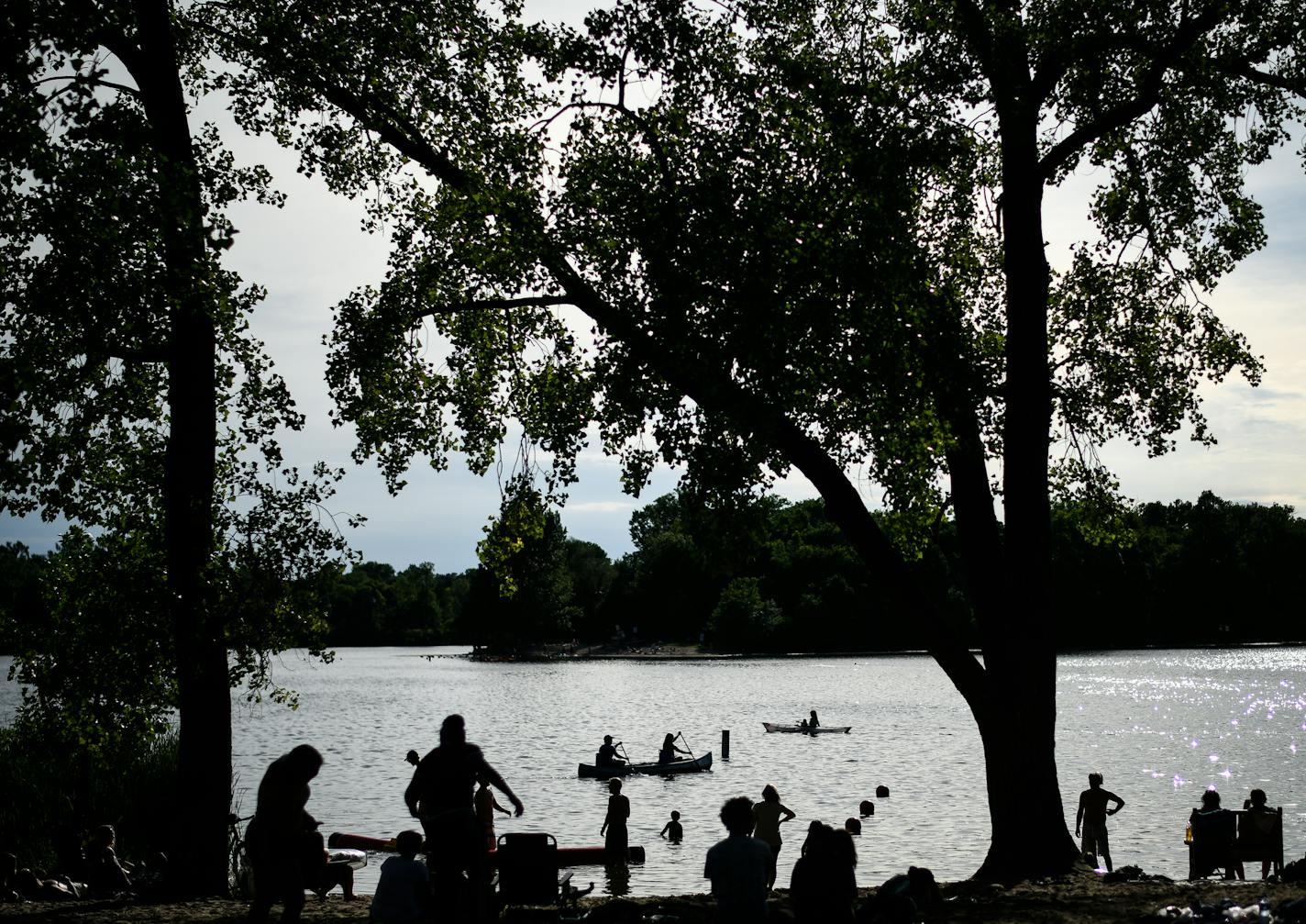 Calm prevailed at Hidden Beach on a recent summer evening. Residents have paid for extra park police patrols.