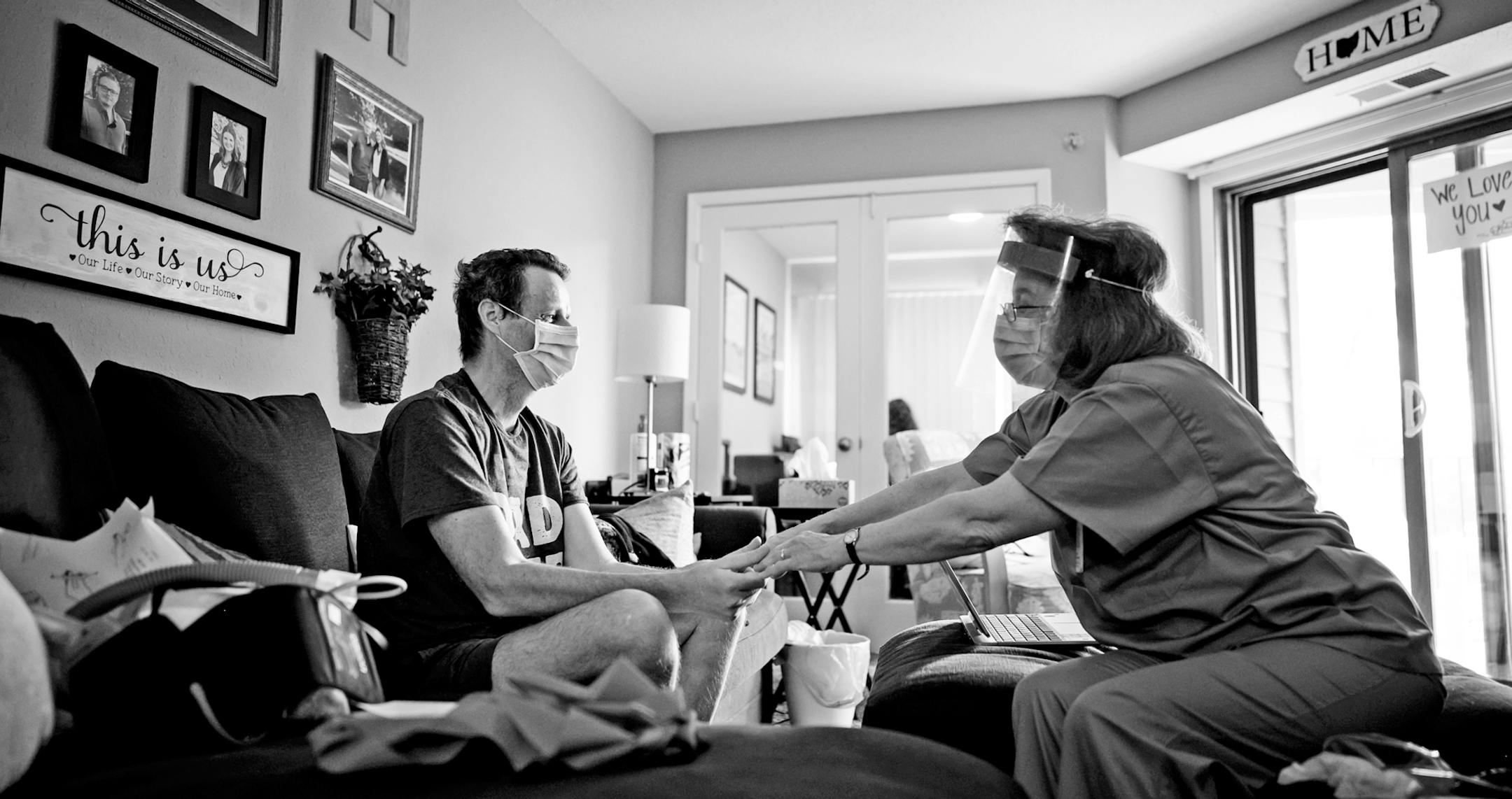 Rick Huggins worked with an M Health Fairview occupational therapist during his first in-home session in late May. She was checking to see the strength of his squeeze. ] aaron.lavinsky@startribune.com Photos to accompany Reid Forgrave's story about five Minnesotans and how they have faced the COVID-19 pandemic, photographed Thursday, May 21, 2020. ORG XMIT: MIN2006302152490257