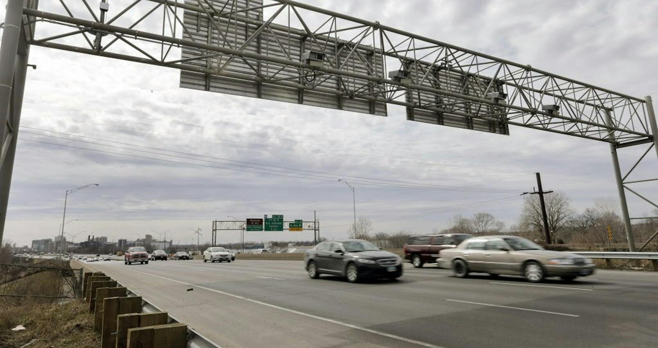 Speed enforcement cameras are seen installed on overhead sign support over northbound Interstate 380 near J Avenue NE in northeast Cedar Rapids, Iowa, on Wednesday, March 18, 2015. The Iowa Department of Transportation ordered the city to cease operation of the cameras and and ones located in the southbound lanes at First Avenue W as motorists have already made their way through the S-curve through downtown Cedar Rapids.