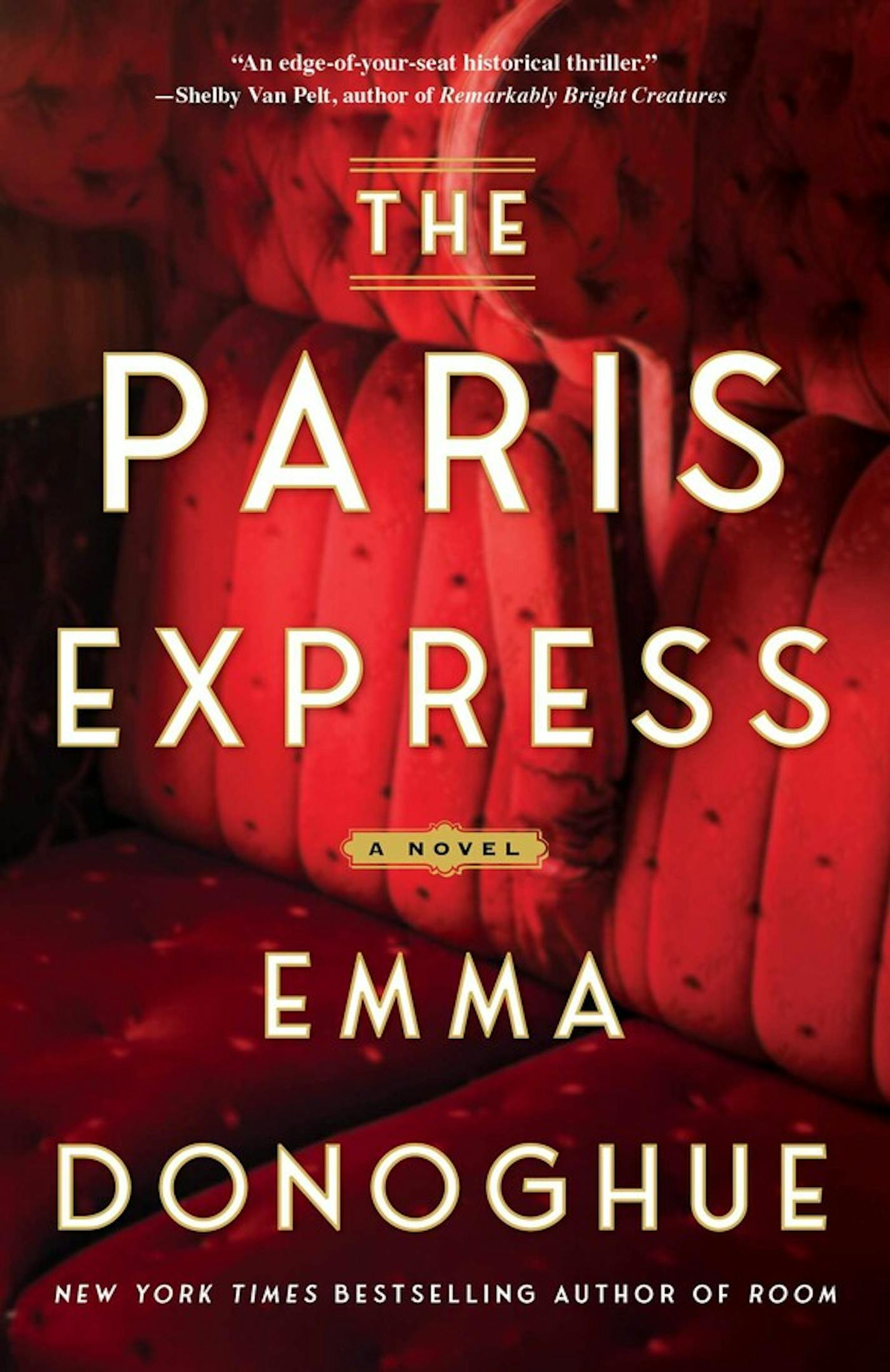 cover of The Paris Express is a photo of a plush red seat on a vintage train