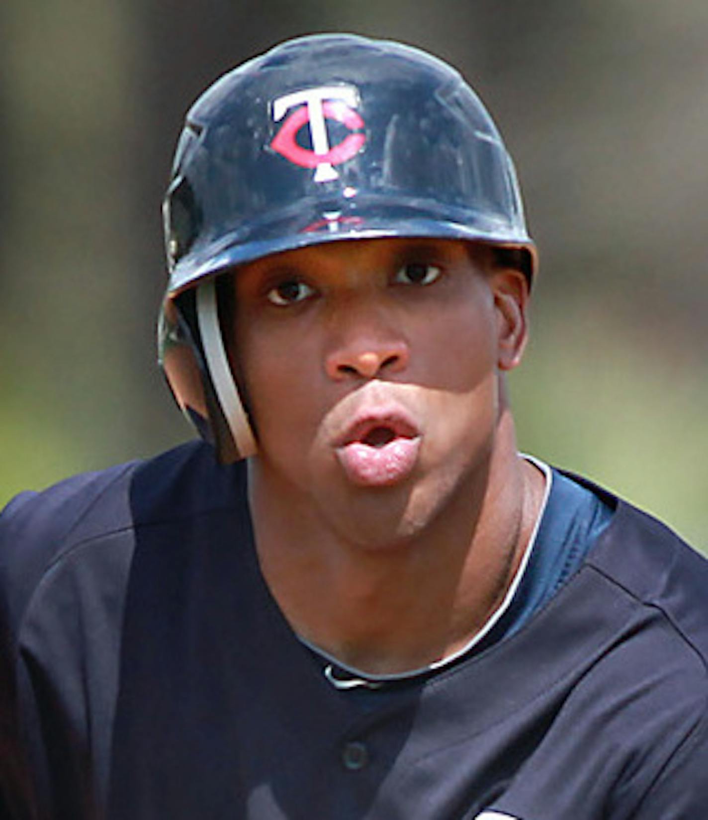 The Minnesota Twins Ben Revere watched the ball as he practiced through running the infield during the team's Spring training workout, Tuesday, February 28, 2012. (ELIZABETH FLORES/STAR TRIBUNE) ELIZABETH FLORES &#x2022; eflores@startribune.com ORG XMIT: MIN2014060420163011