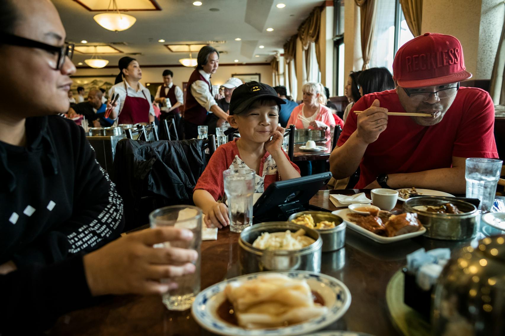 With his nephew Saiyan Ren part of the dining experience, far left, Sawanree Ren enjoys bringing his youngest son Jaxson,5, to eat dim sum . The family tries to dine out together twice a month so that they can remain familiar with Asian culture and food. ] Mandarin Kitchen is one of the favored dim sum spot in the Twin Cities where families come find their favorite dumplings. .RICHARD TSONG-TAATARII ¥ richard.tsong-taatarii@startribune.com