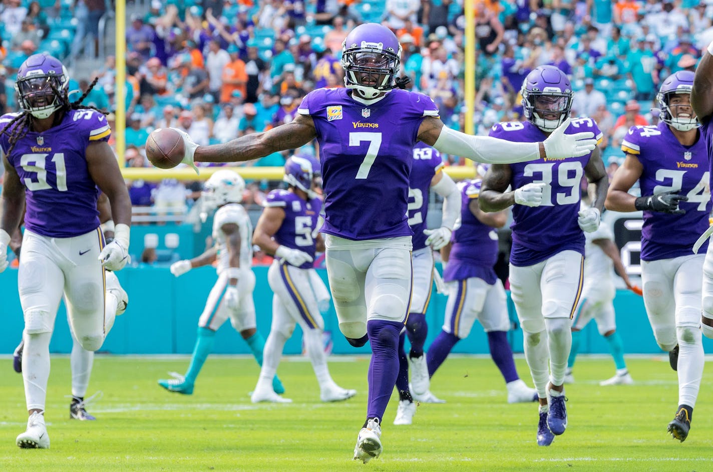 Patrick Peterson (7) of the Minnesota Vikings celebrates with teammates after an interception in the fourth quarter Sunday, October 16, 2022, at Hard Rock Stadium in Miami Gardens, FL. ] CARLOS GONZALEZ • carlos.gonzalez@startribune.com.