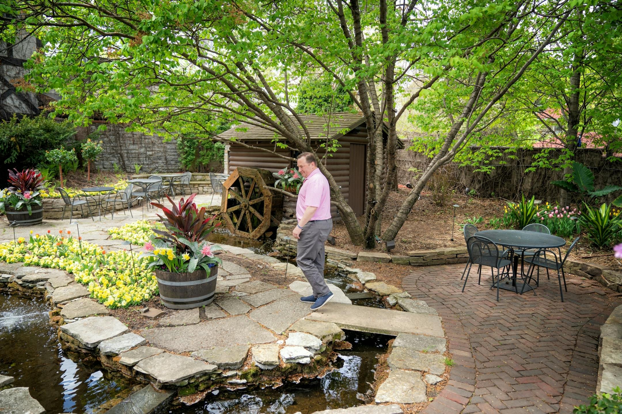 Bill Kozlak, owner of Jax Cafe. This outdoor patio is usually filled with diners. In the early 1950's Jax became the first restaurant to offer outdoor dining. The stream in the outdoor patio is stocked with trout where diners can pick the trout of their choice for dinner.