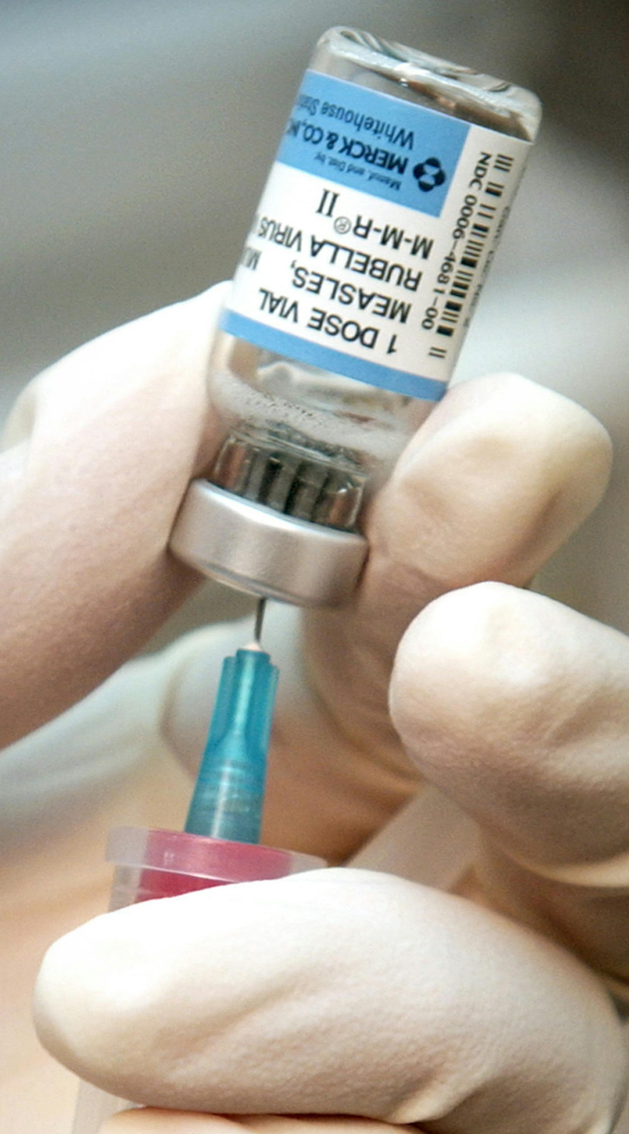 FILE - In this April 24, 2006 file photo, Darrie Hutchison, an R.N. at the Wichita Clinic draws a dose of mumps, measles, and rubella vaccine in Wichita, Kan. Measles cases in the last five months have caused more U.S. illnesses than in any entire year since 1996, according to numbers released by the Center for Disease control and Prevention on Thursday, May 29, 2014. (AP Photo/The Wichita Eagle, Mike Hutmacher, File) LOCAL TV OUT; MAGS OUT; LOCAL RADIO OUT; LOCAL INTERNET OUT