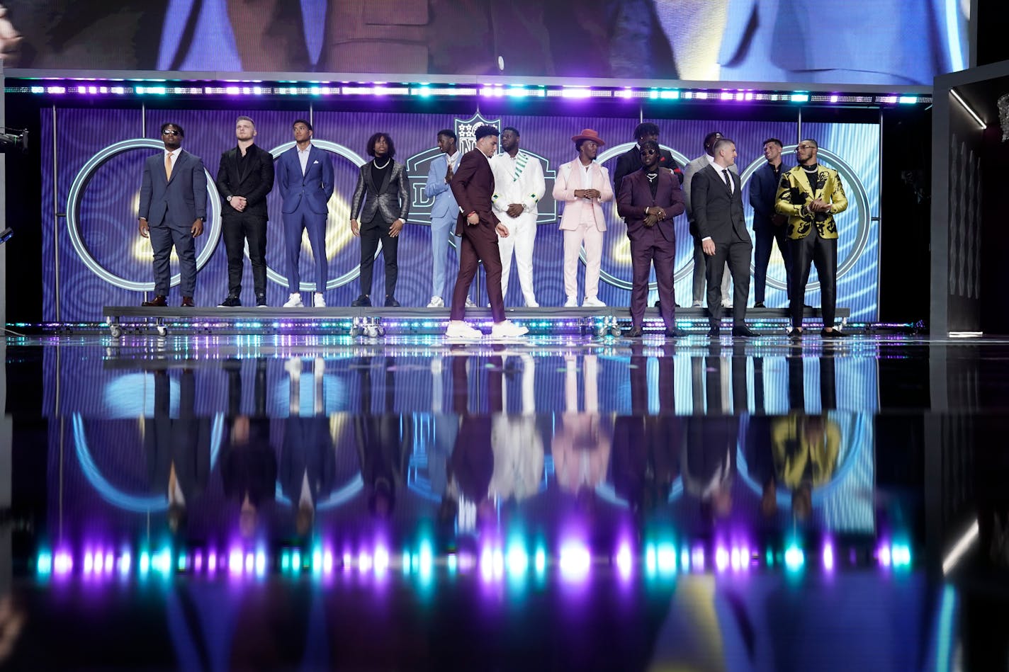 Top prospects gather on the stage during the first round of the NFL draft Thursday in Las Vegas.