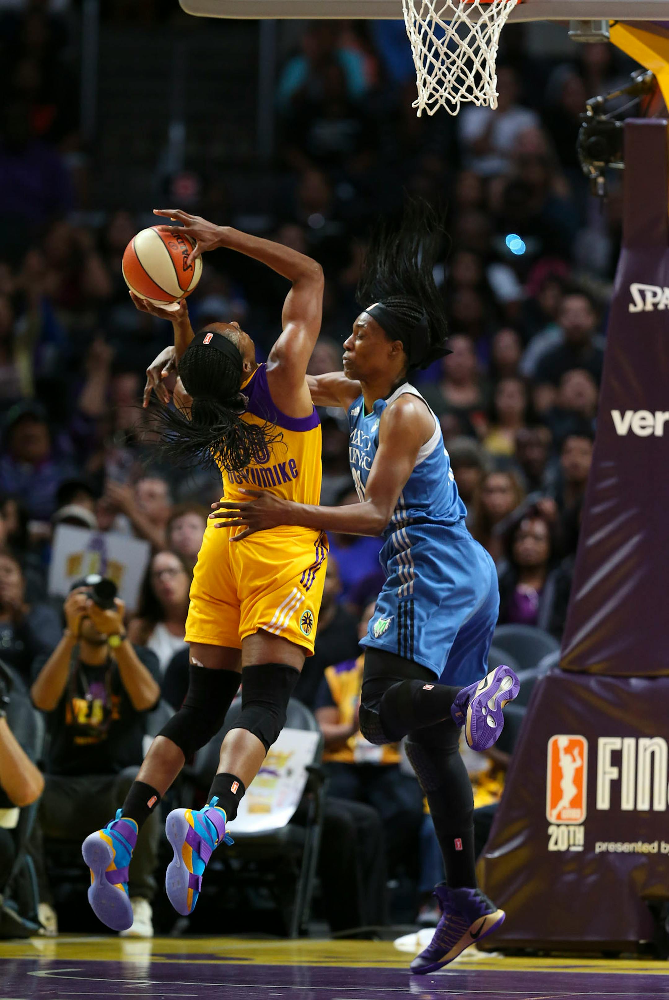 Minnesota Lynx center Sylvia Fowles (34) fouled Los Angeles Sparks forward Nneka Ogwumike (30) in the first quarter.