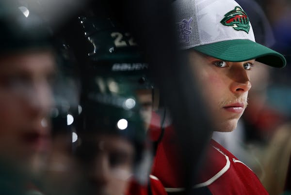Minnesota Wild goalie Darcy Kuemper (35) watched from the bench in the second period. Kuemper gave up four goals in the first period and was replaced 