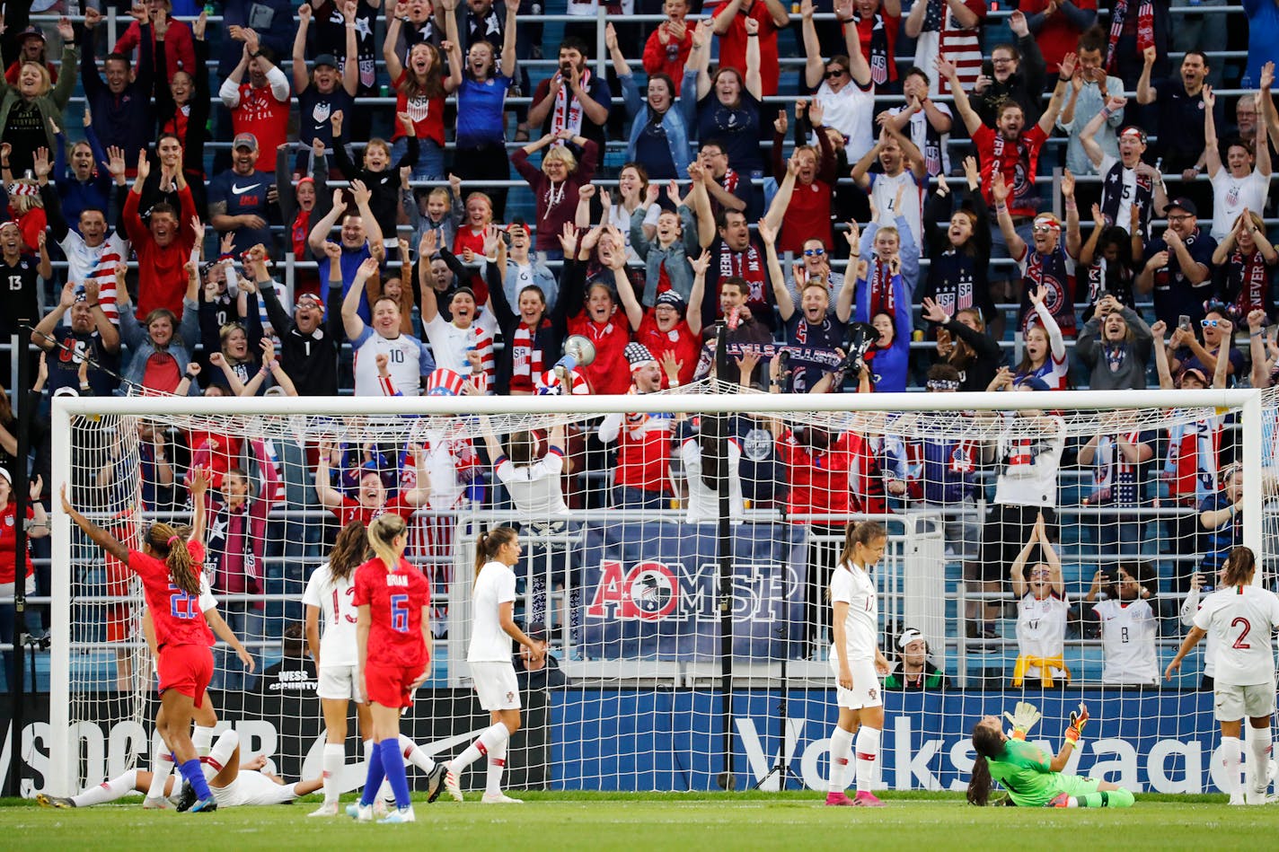 USA fans react after USA forward Carli Lloyd (10) scored a goal during the first half.