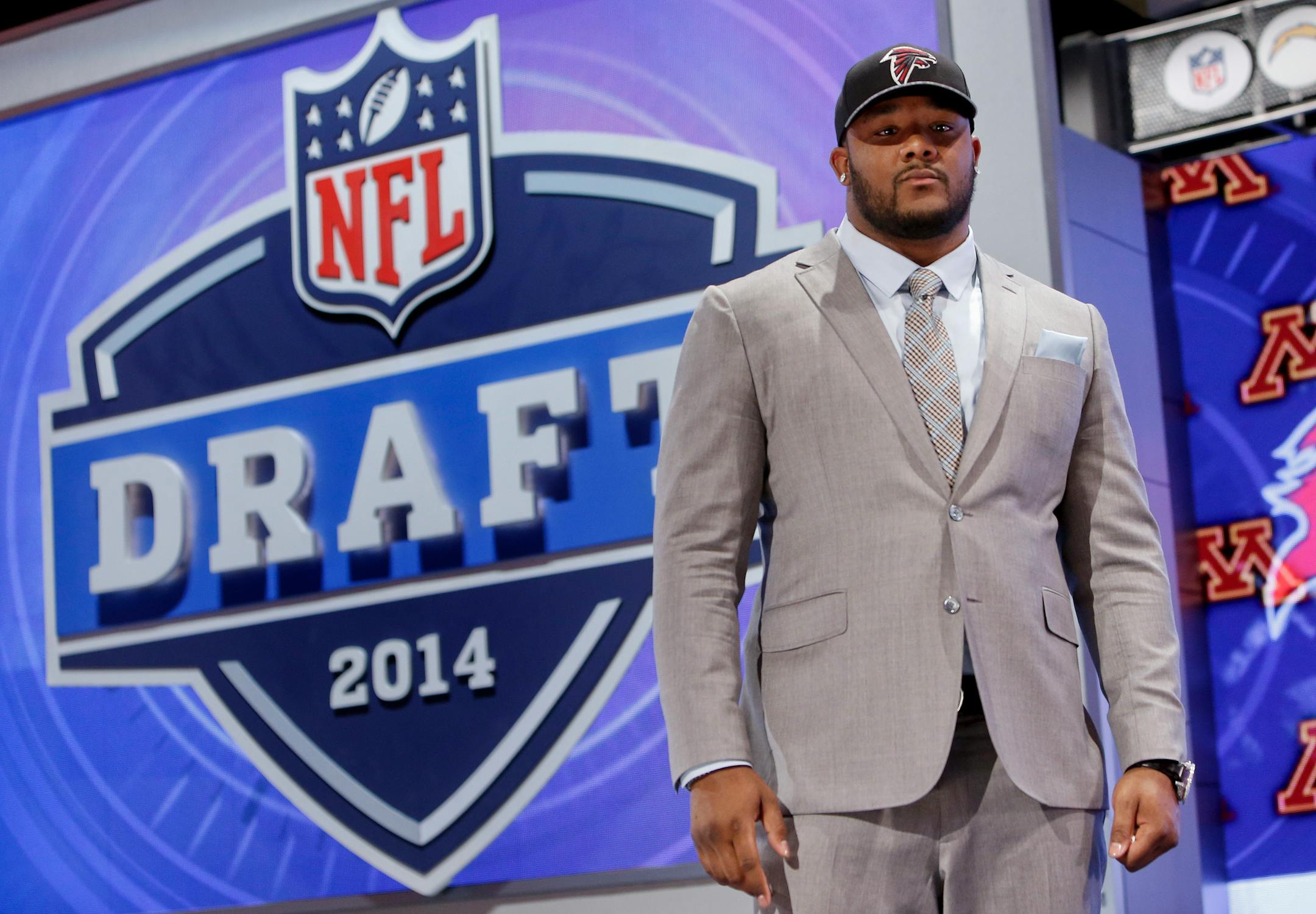 Minnesota defensive tackle Ra'Shede Hageman poses for photos after being selected by the Atlanta Falcons as the 37th pick during the second round of the 2014 NFL Draft, Friday, May 9, 2014, in New York. (AP Photo/Jason DeCrow)