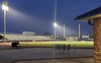 Hopkins High School football field lit up on Monday night, one of about 220 schools around the state that turned on stadium lights to honor students a