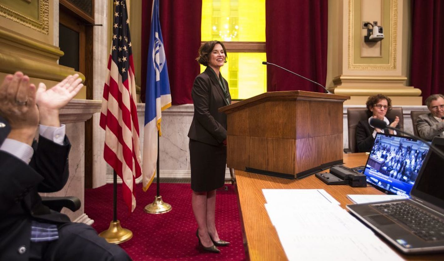 Minneapolis Mayor Betsy Hodges receives applause after delivering her 2016 budget address to the City Council at Minneapolis City Hall on Wednesday, August 12, 2015.