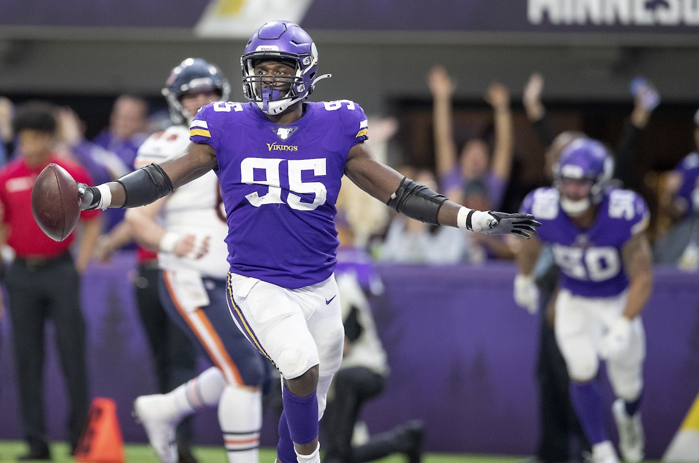 Minnesota Vikings defensive end Ifeadi Odenigbo ran with the ball after recovering the ball from Chicago in the fourth quarter.