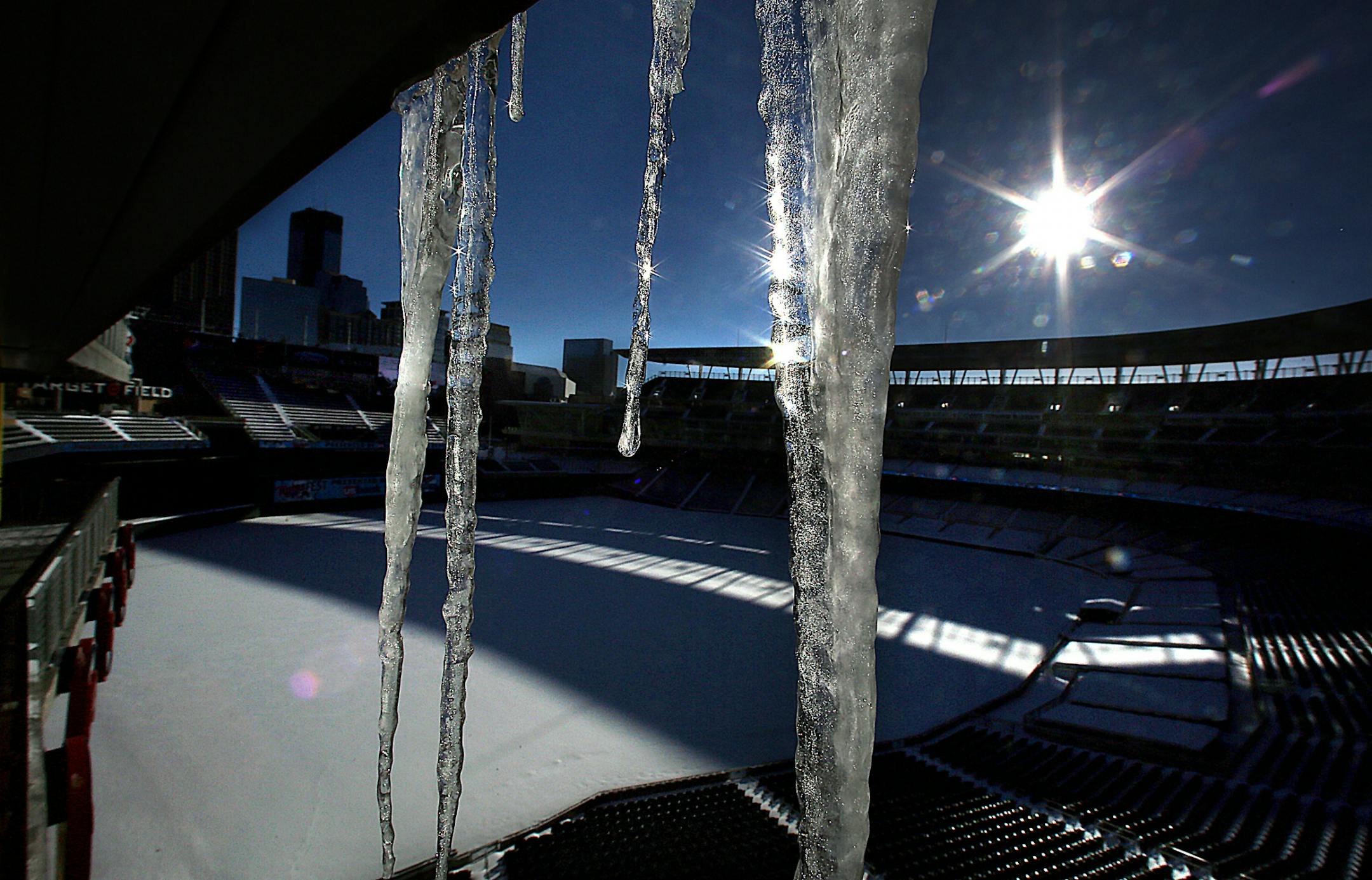 While spring may be just around the corner, winter maintains its grip on Target Field, site of the 2014 Twinsfest event .