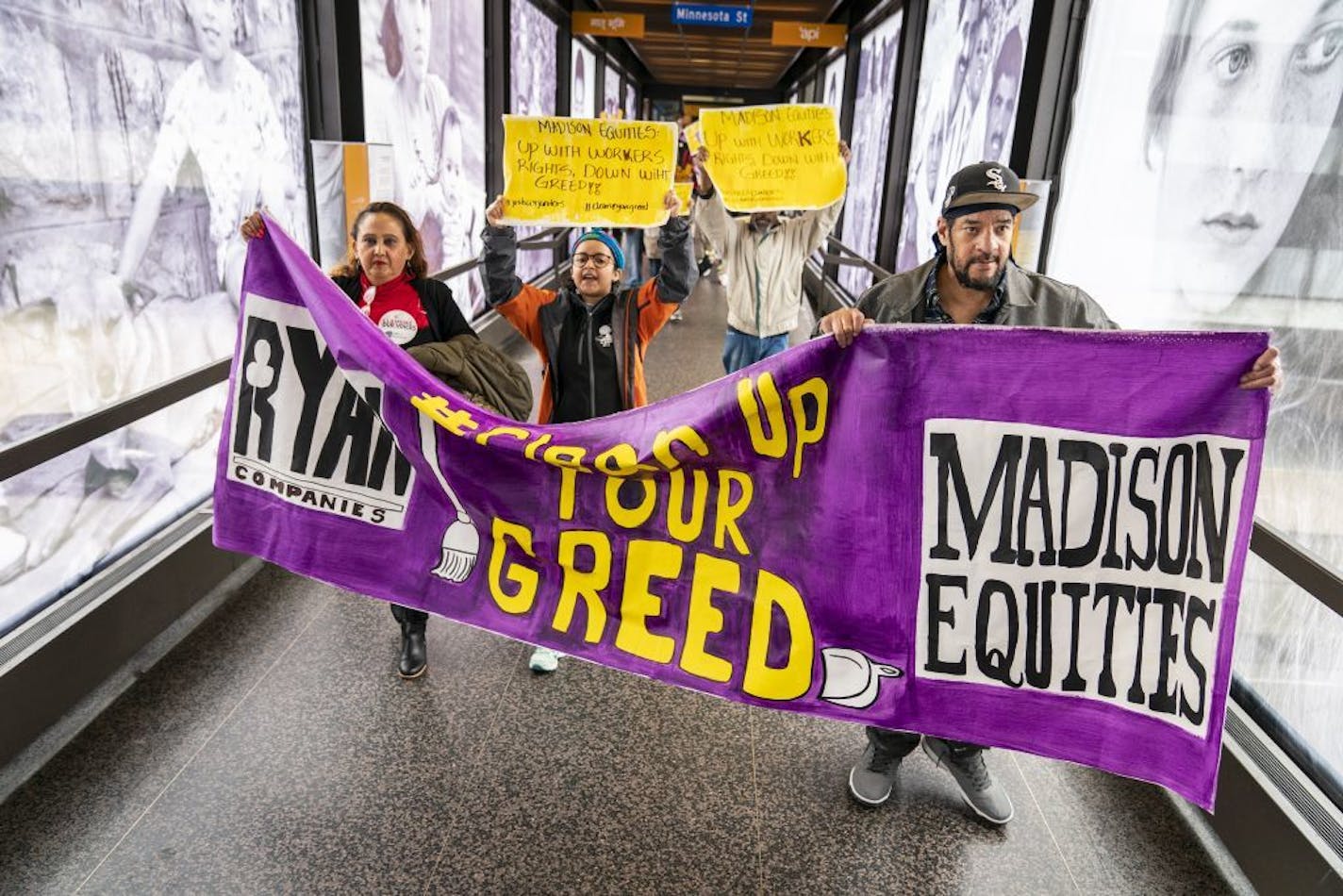 St. Paul workers and organizers march through the skyway in downtown St. Paul.