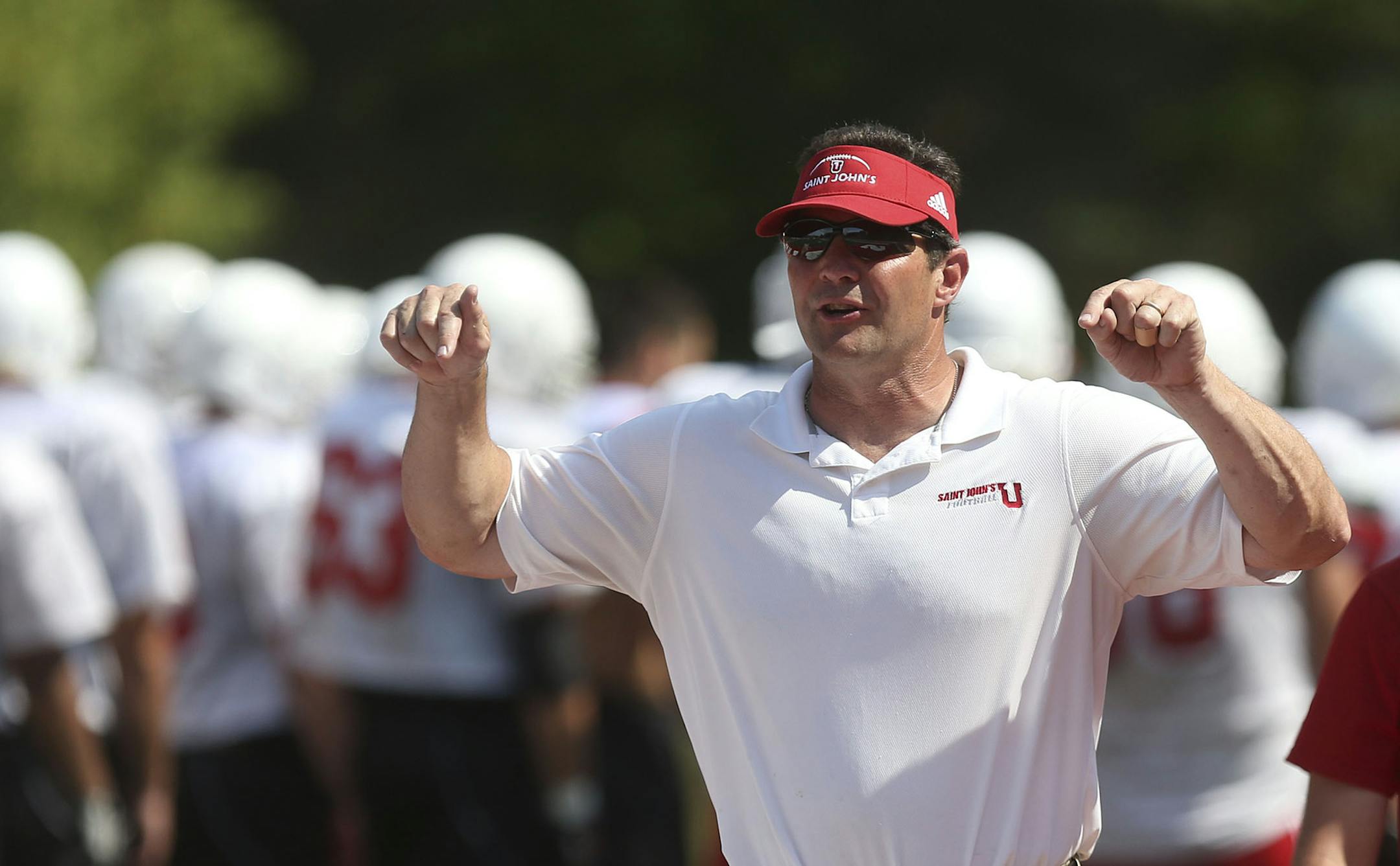 Head Coach Gary Fasching gave instructions to the kicking team during practice at St John's University in Collegeville Min., Wednesday, August 21, 2013. ] (KYNDELL HARKNESS/STAR TRIBUNE) kyndell.harkness@startribune.com