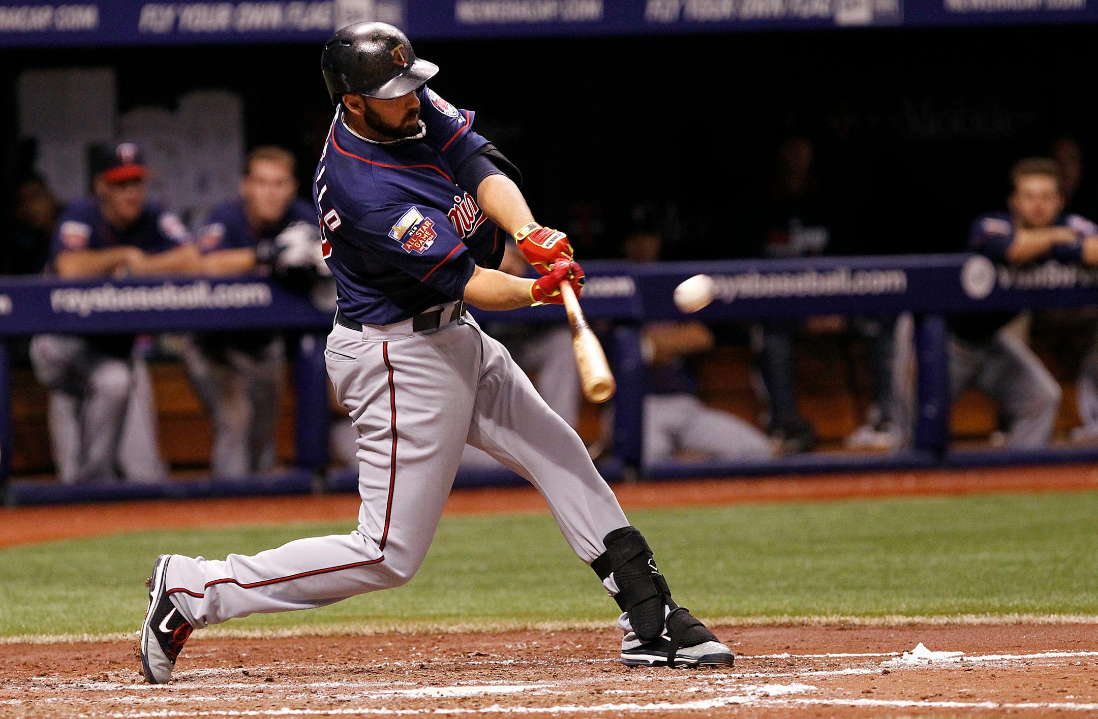 Minnesota Twins designated hitter Chris Colabello hits a two-run home run off of Tampa Bay Rays starting pitcher Jake Odorizzi during the fourth inning of a baseball game on Wednesday, April 23, 2014, in St. Petersburg, Fla. (AP Photo/Brian Blanco)