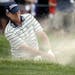 Steve Stricker hits out of a bunker on the fourth hole during the fourth round of the U.S. Open golf tournament at Merion Golf Club, Sunday, June 16, 