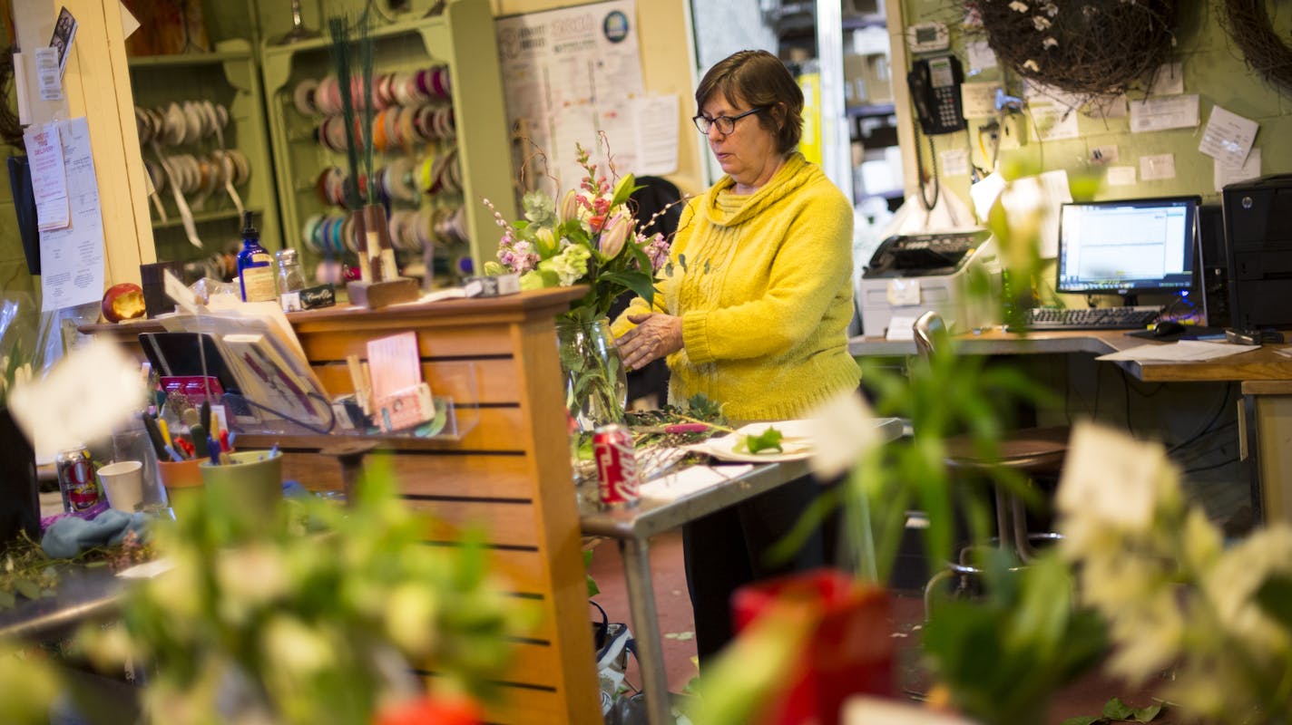 Fleur de Lis Flowers owner Robin Rivard counted the types and quantity of flowers she put in an arrangement Friday afternoon to price out the arrangement. ] (AARON LAVINSKY/STAR TRIBUNE) aaron.lavinsky@startribune.com From 2001 to 2014, Minnesota saw the nation's third biggest employment drop at florists -- nearly 65 percent -- due to more florists at grocery stores and, of course, online shopping. Robin Rivard opened Fleur de Lis Flowers in 1981 and has been able to weather the downturn in the