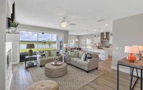 This Florida model home has modern farmhouse style and neutral color palette with color pops. 
