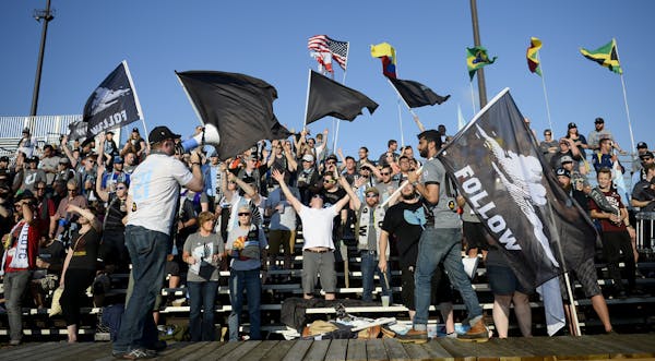 Minnesota United FC fans cheered for their team before the start of Saturday night's game against the Fort Lauderdale Strikers. ] (AARON LAVINSKY/STAR