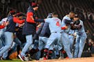 The Twins celebrated with Miguel Sano (22) after their victory on Tuesday.